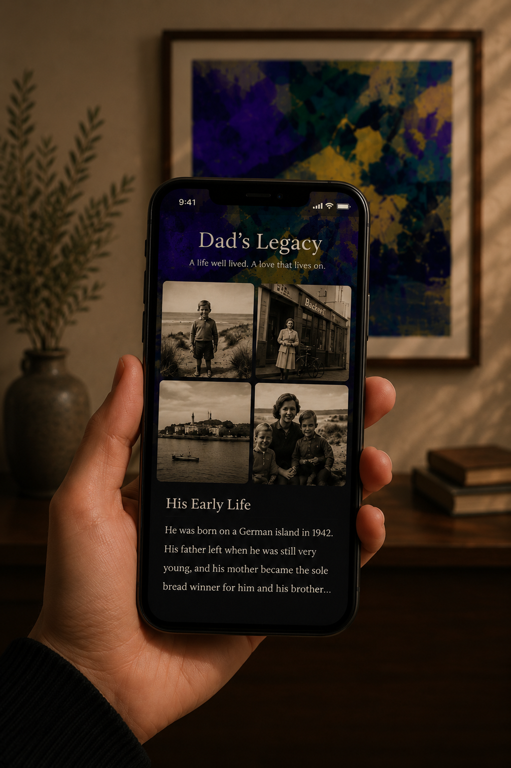 A hand holding a phone showing a Memory Portal digital gallery